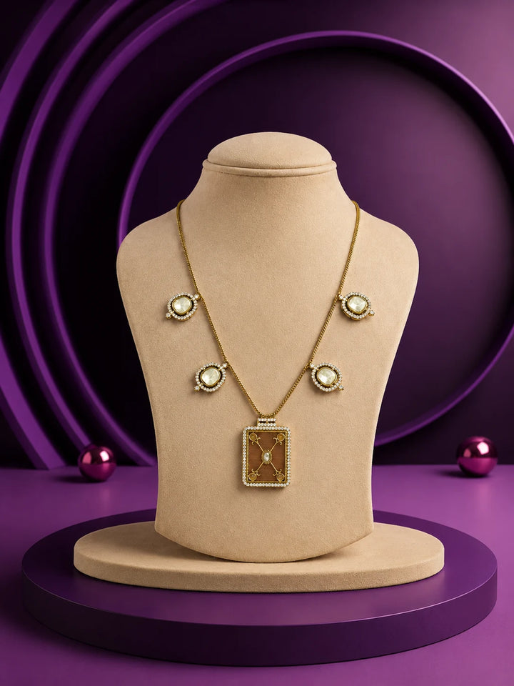 Kundan pendant necklace set with champagne stones, gold-toned chain, crystal detailing, and matching earrings
