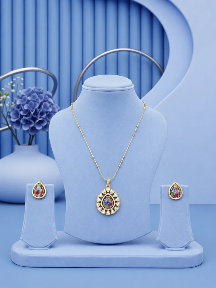 Teardrop Stone Pendant Set with multicolor center stone and matching gold-toned earrings