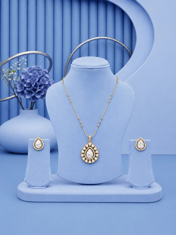 Teardrop Stone Pendant Set with white stone pendant and matching gold-toned earrings