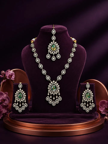 Bridal Kundan Necklace Set with green teardrop center stones, chandelier pendant, matching earrings, and maang tikka