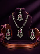 Bridal Kundan Necklace Set with pink teardrop center stones, white kundan-style work, matching earrings, and maang tikka