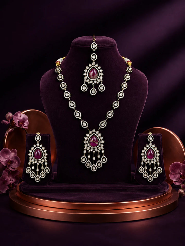 Bridal Kundan Necklace Set with pink teardrop center stones, white kundan-style work, matching earrings, and maang tikka