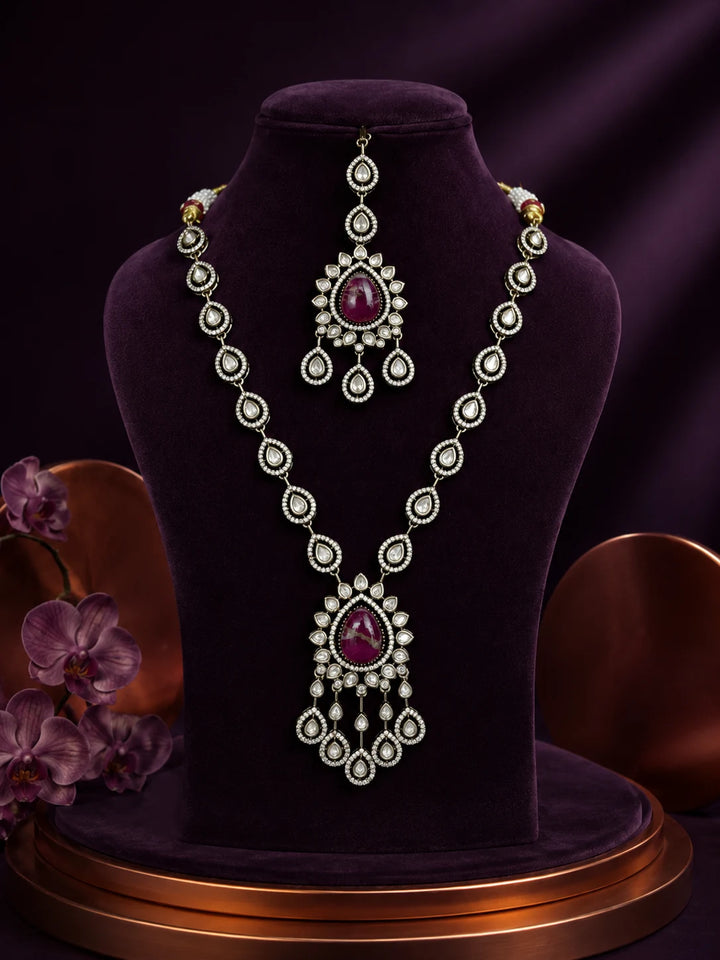 Bridal Kundan Necklace Set with pink teardrop center stones, white kundan-style work, matching earrings, and maang tikka
