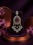 Bridal Kundan Necklace Set with pink teardrop center stones, white kundan-style work, matching earrings, and maang tikka