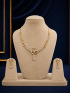 Spiral Drop Necklace Set with gold-toned spiral motif, white crystal drop stones, linked circle details, and matching earrings