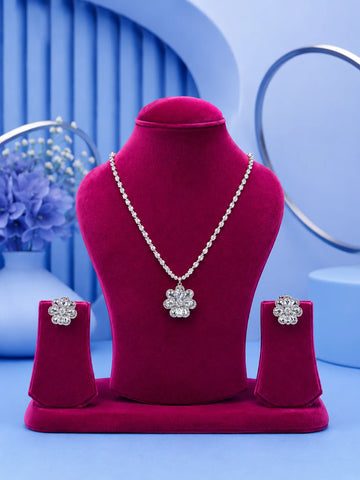 White Floral Necklace Set with silver-toned crystal chain, floral pendant, and matching stud earrings
