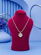 White Floral Necklace Set with silver-toned crystal chain, floral pendant, and matching stud earrings