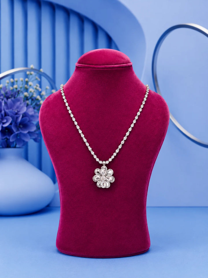 White Floral Necklace Set with silver-toned crystal chain, floral pendant, and matching stud earrings
