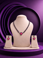 Pink Heart Necklace Set with black-toned crystal chain, pink heart pendant, crystal border, and matching drop earrings