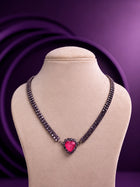 Pink Heart Necklace Set with black-toned crystal chain, pink heart pendant, crystal border, and matching drop earrings