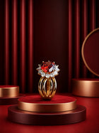 Red Crystal Ring with gold-toned halo design, bold red center stone, clear crystal-style accents, and broad statement band