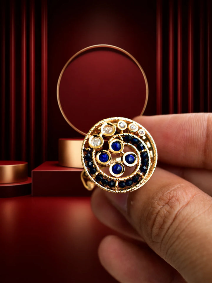 Blue Beaded Kundan Ring with gold-toned round design, deep blue bead accents, white kundan-style stones, and crystal detailing
