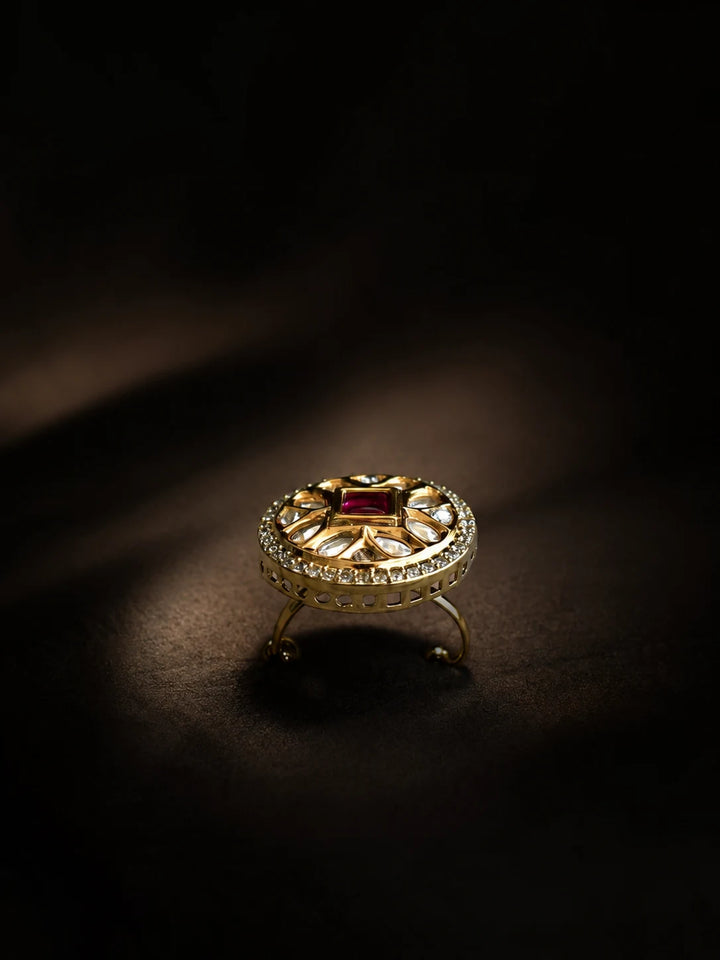 Square Kundan Ring with red square center stone, gold-toned round design, white kundan-style accents, and crystal border