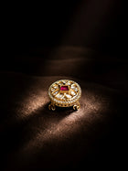 Square Kundan Ring with red square center stone, gold-toned round design, white kundan-style accents, and crystal border