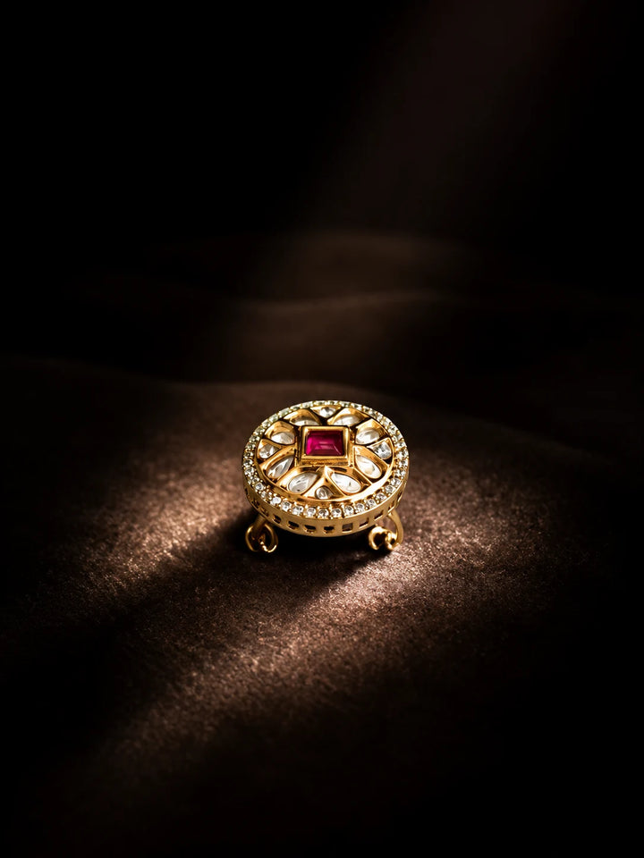Square Kundan Ring with red square center stone, gold-toned round design, white kundan-style accents, and crystal border