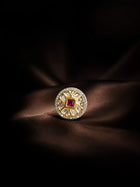 Square Kundan Ring with red square center stone, gold-toned round design, white kundan-style accents, and crystal border
