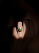 Square Kundan Ring with green square center stone, gold-toned statement design, white kundan-style accents, and crystal border
