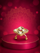 Floral Kundan Ring with red square center stone, gold-toned floral design, white kundan-style stones, and crystal border