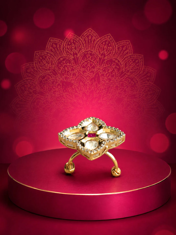 Floral Kundan Ring with red square center stone, gold-toned floral design, white kundan-style stones, and crystal border