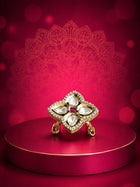 Floral Kundan Ring with red square center stone, gold-toned floral design, white kundan-style stones, and crystal border
