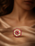 Beaded Kundan Ring with red bead border, gold-toned round design, red center stone, white kundan-style stones, and crystal accents