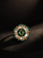 Beaded Kundan Ring with dark green bead border, gold-toned round design, white kundan-style stones, and green center stone