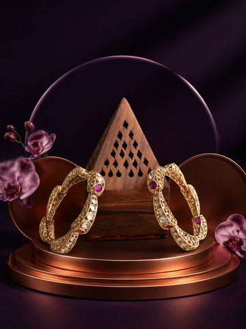 Pink Kundan Bangles with gold-toned kada design, pink stones, white kundan-style accents, and ornate filigree work
