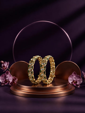 Green Kundan Bangles with gold-toned kada design, white kundan-style stones, green meenakari accents, and linked oval motifs