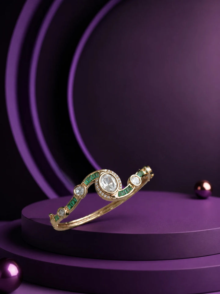 Crystal Kundan Bracelet with green stone accents, gold-toned openable kada design, and clear kundan-style stones