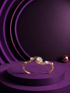 Crystal Kundan Bracelet with pink stone accents, gold-toned curved kada design, and clear kundan-style detailing