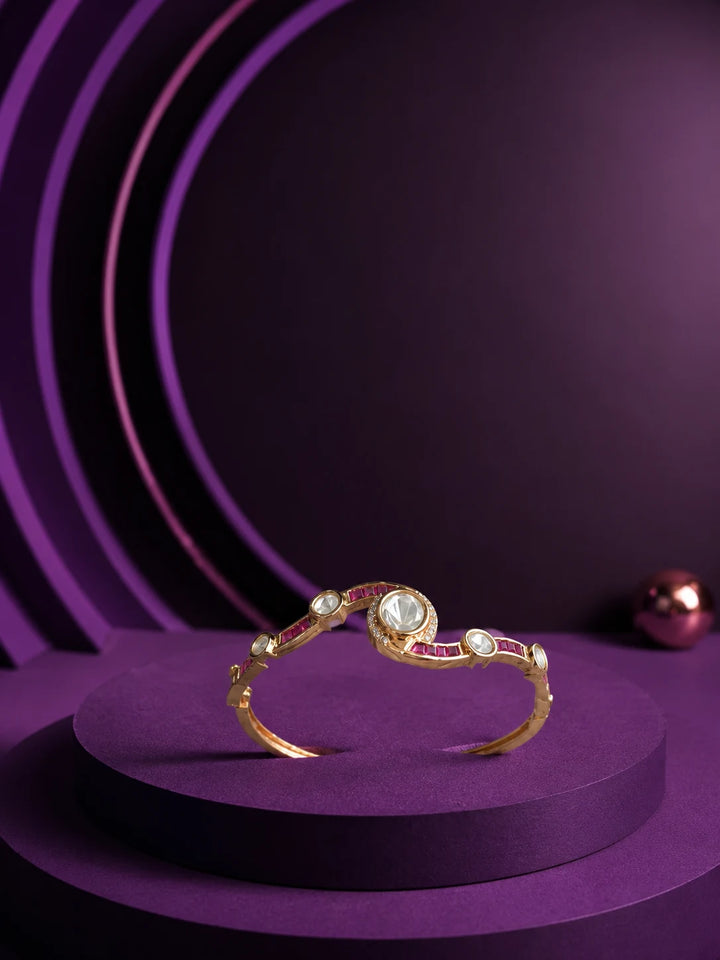 Crystal Kundan Bracelet with pink stone accents, gold-toned curved kada design, and clear kundan-style detailing