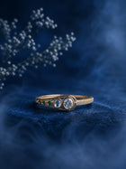 Kundan Stone Bracelet with gold-toned openable kada design, green accent stones, white kundan-style stones, and crystal detailing