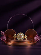 Floral Kundan Ring with pink center stone, gold-toned round design, white kundan-style accents, and side floral motifs