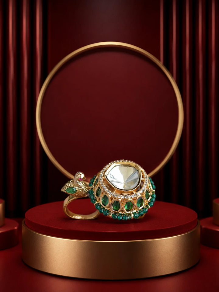 Peacock Kundan Ring with gold-toned double ring design, green stone detailing, and kundan-style accents