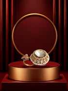 Peacock Kundan Ring with gold-toned bird motif, pearl-style detailing, white kundan-style stones, and round statement top