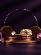 Kundan Two Finger Ring with pink center stone, gold-toned dual design, white kundan-style accents, and crystal detailing