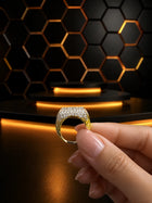 Gold-Toned Crystal Ring with broad geometric design, clear crystal-style pavé work, and side cutout detailing