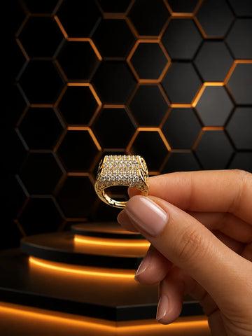 Gold-Toned Crystal Ring with broad geometric design, clear crystal-style pavé work, and side cutout detailing