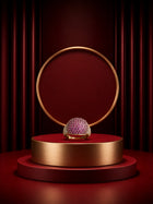Pink Crystal Ring with gold-toned band, pavé-style magenta crystal top, and clear side accents