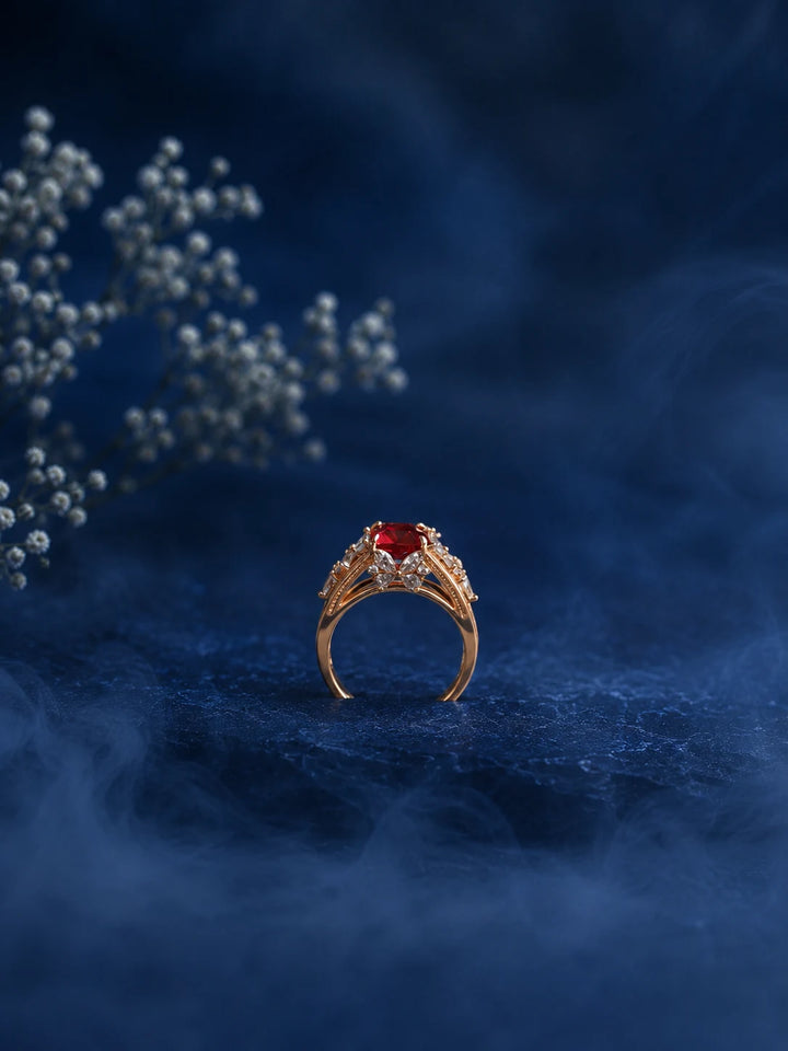 Red Stone Ring with square red center stone, gold-toned band, and clear crystal-style side accents
